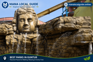 Waterfall statue attraction at a popular park in Guntur